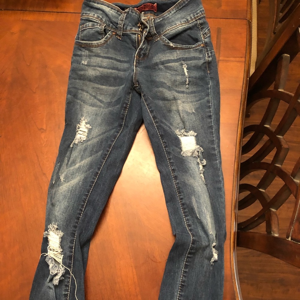 dark wash jeans with rips